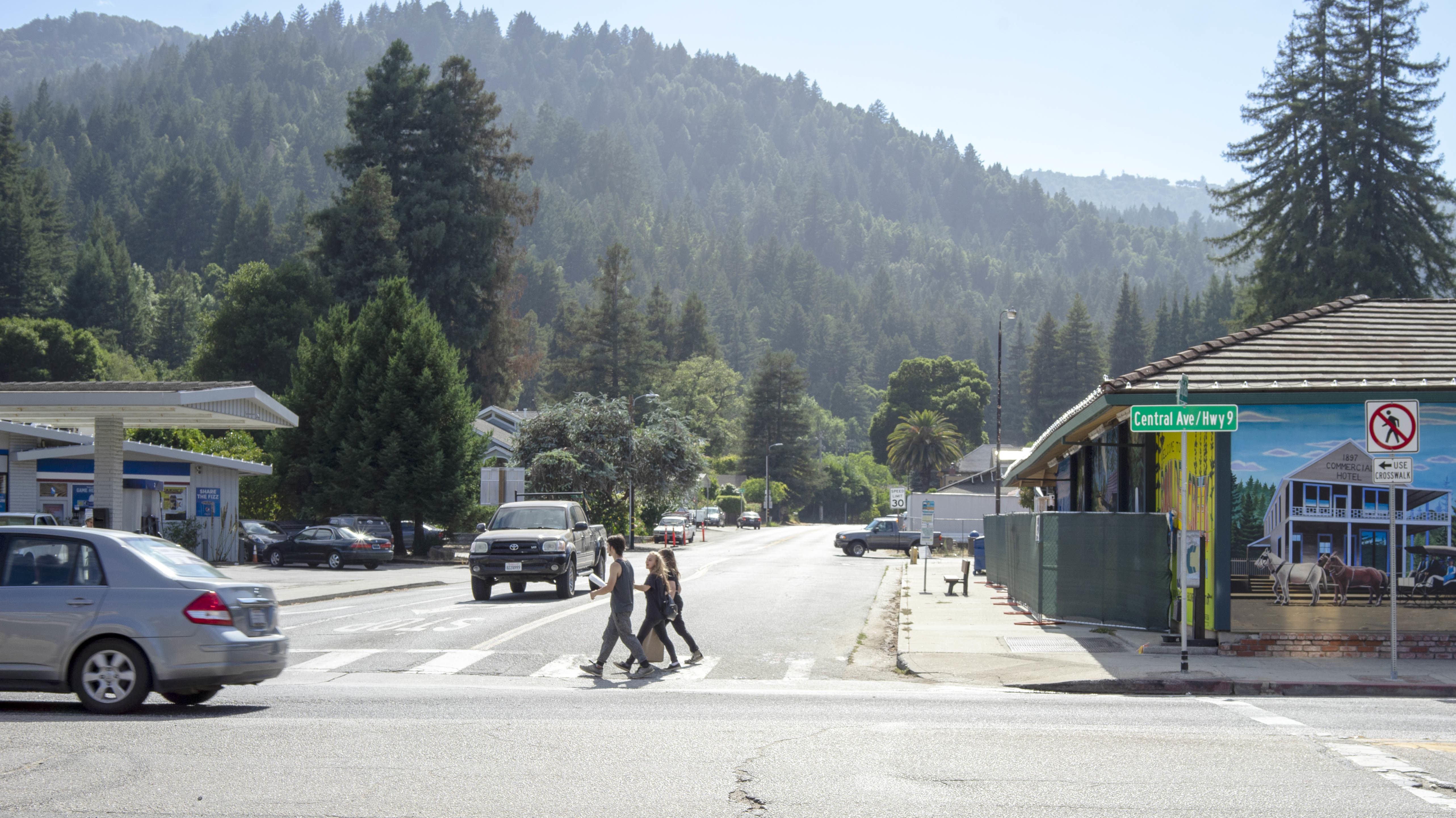 Pedestrians cross Big Basin Highway at Highway 9 in Boulder Creek