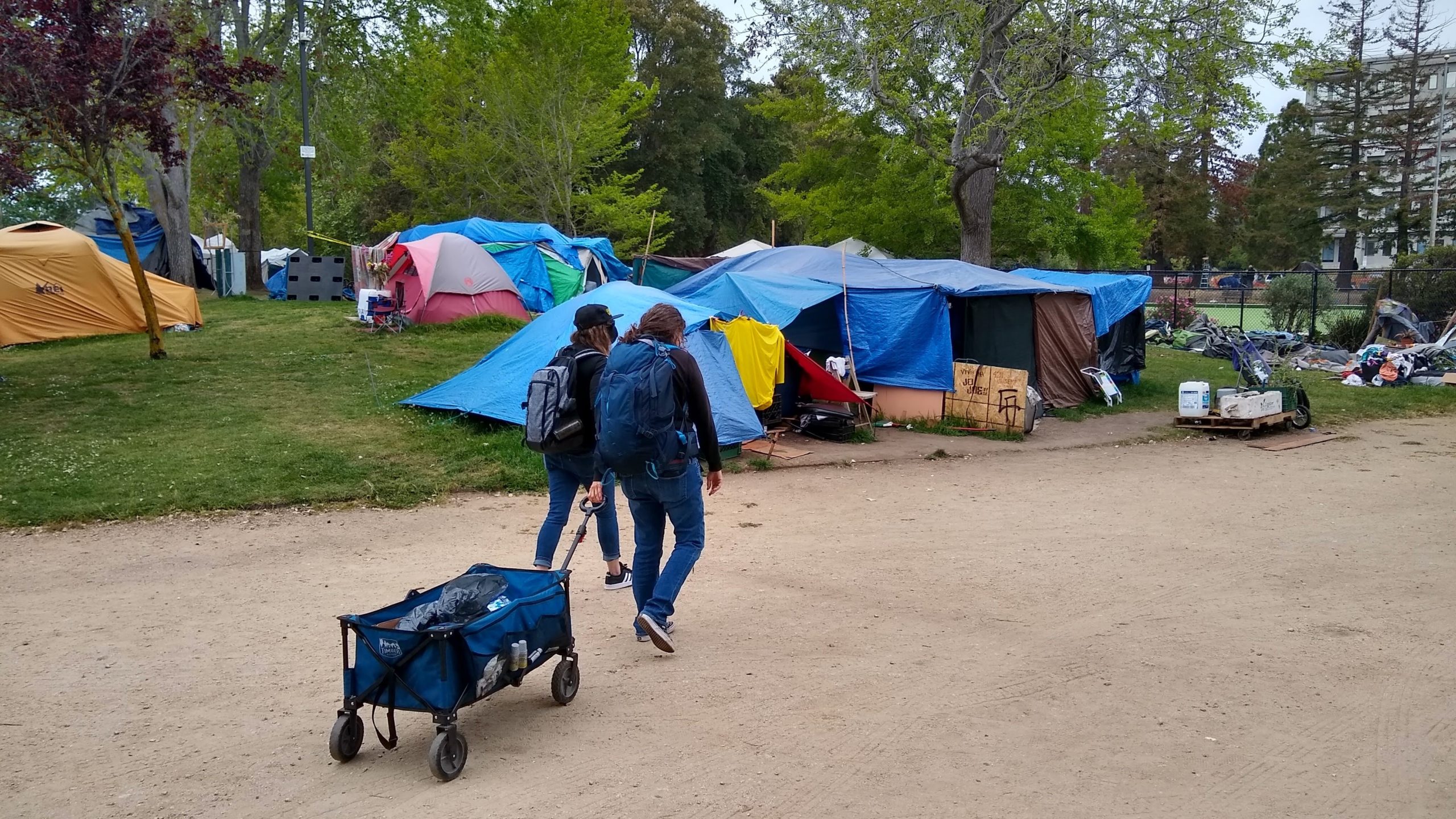 The Homeless Persons Health Project facilitates behavioral health services and provides water, first aid and other supplies at the benchlands near San Lorenzo Park in Santa Cruz in 2021. (Stephen Baxter — Santa Cruz Local file)