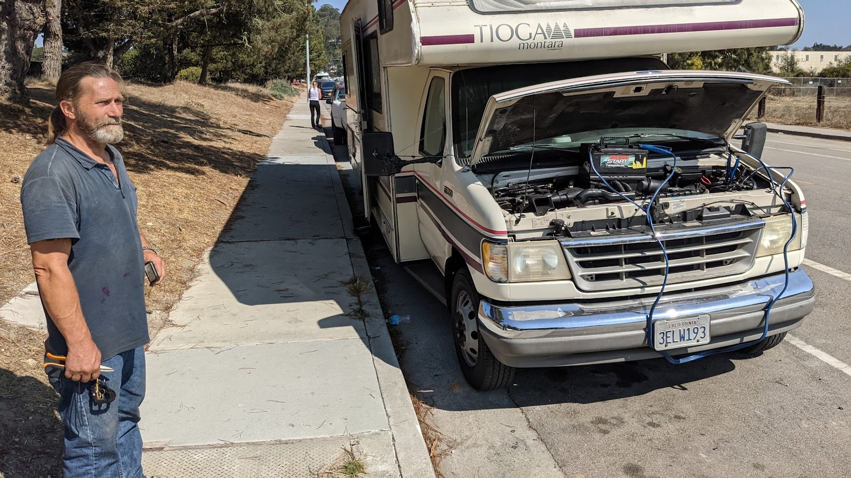 John Daugherty stands by his RV on Delaware Avenue in Santa Cruz