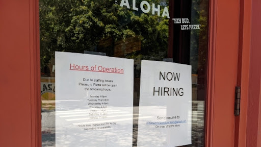 Now hiring sign at Pleasure Pizza in Santa Cruz