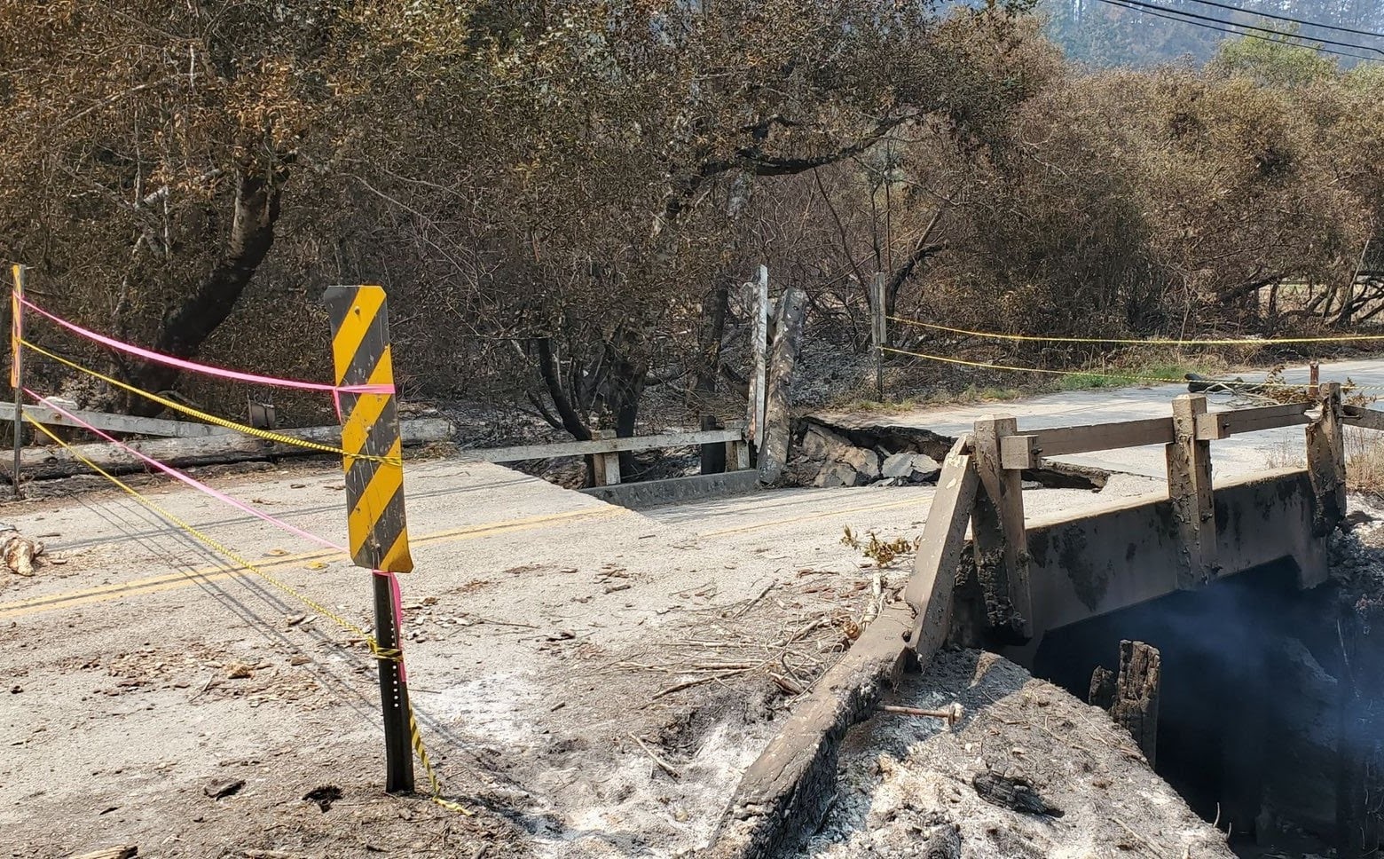 A road is closed after damage during the CZU Lightning Complex Fire in 2020. (Cal Fire)