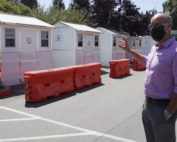 Housing Matters CEO Phil Kramer gives a tour of Pallet Shelters in May 2020.