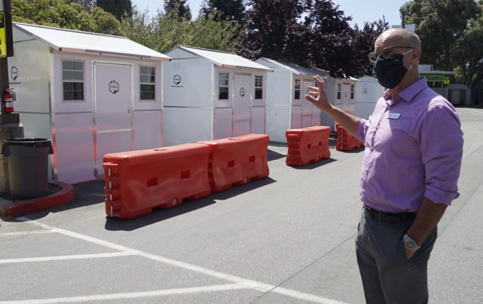 Housing Matters CEO Phil Kramer gives a tour of Pallet Shelters in May 2020.