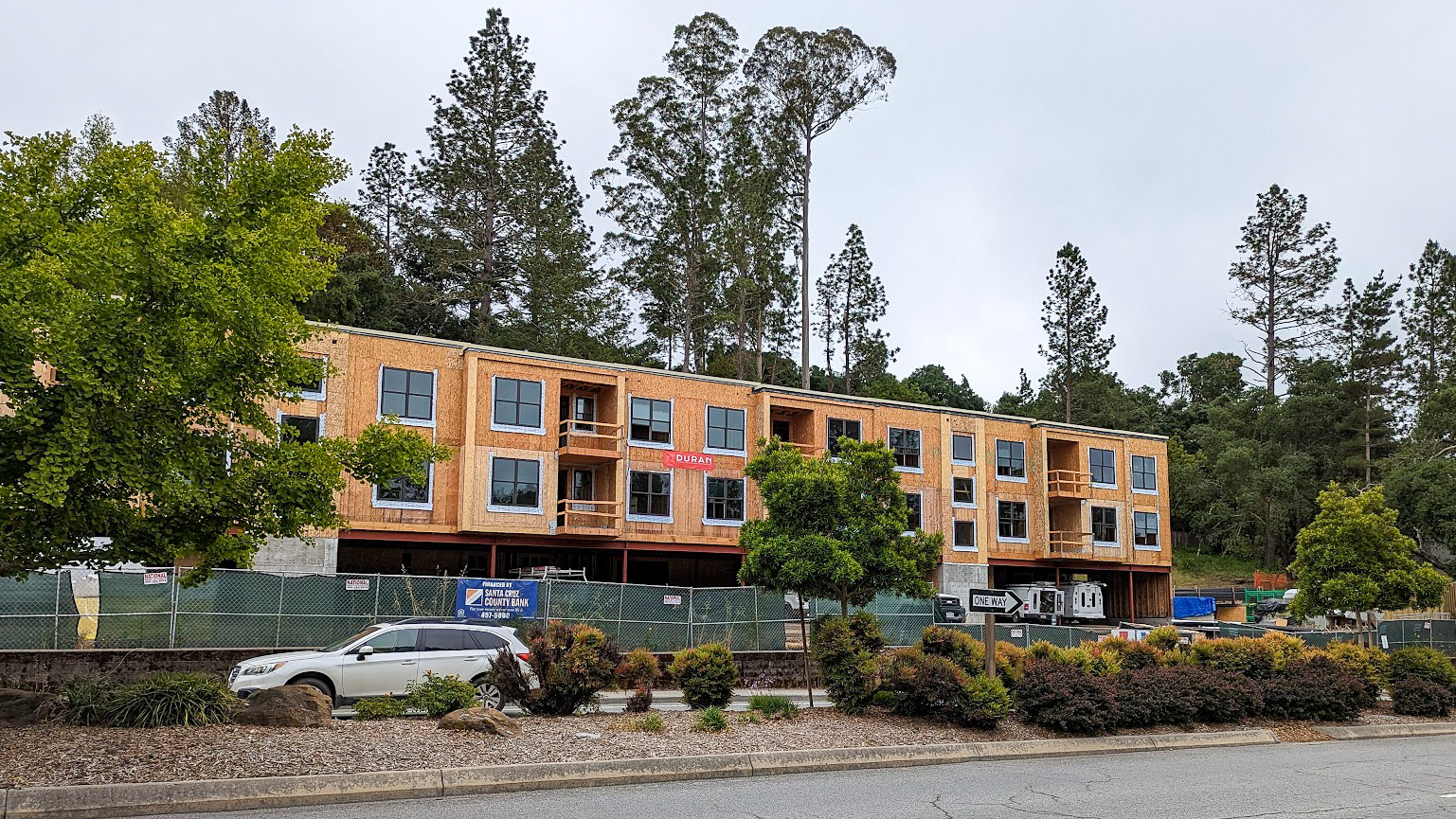 Construction continues on a 16-unit condominium project at 4104 Scotts Valley Drive in June. (Stephen Baxter — Santa Cruz Local)