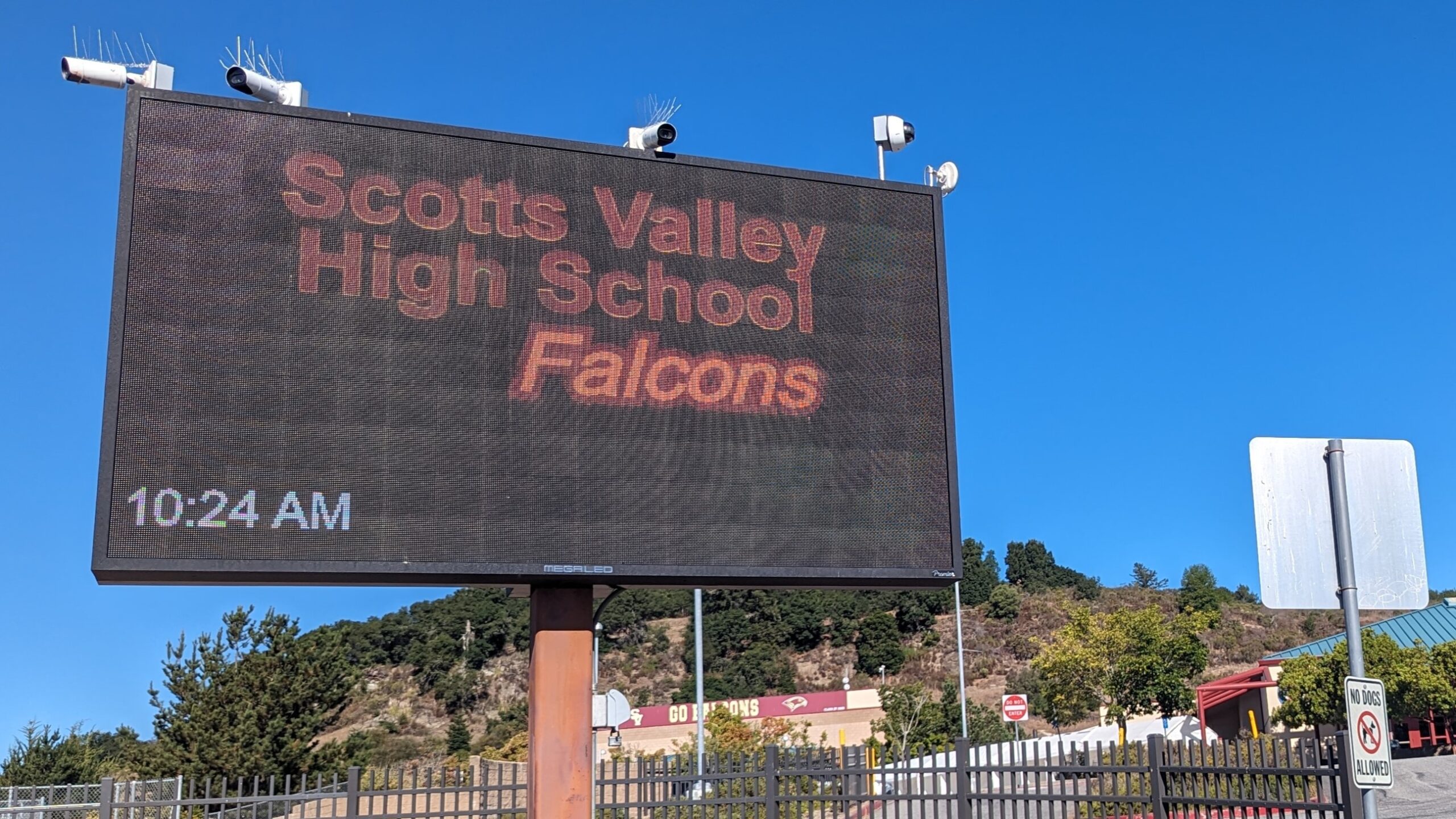 A sports scoreboard reads Scotts Valley High School Falcons.