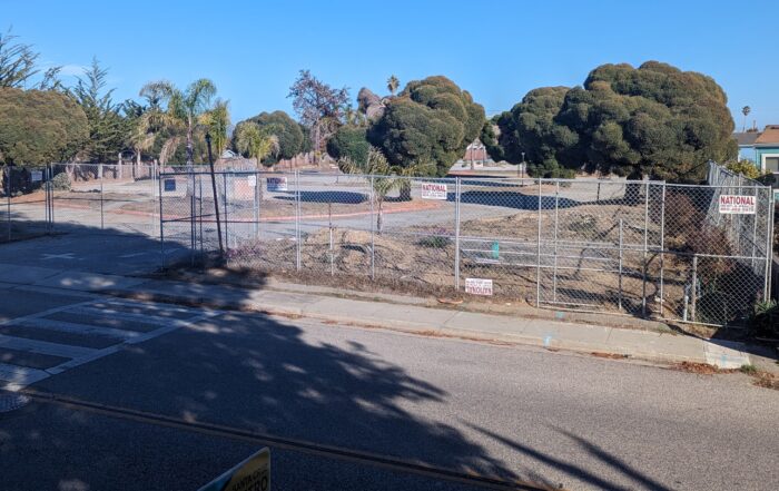 A chain link fence surrounds the property where MidPen Housing is proposing an affordable housing project.