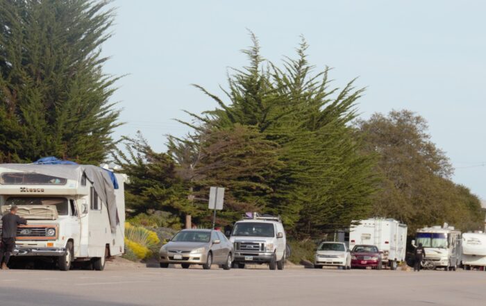 RVs and other vehicles line Delaware Avenue.