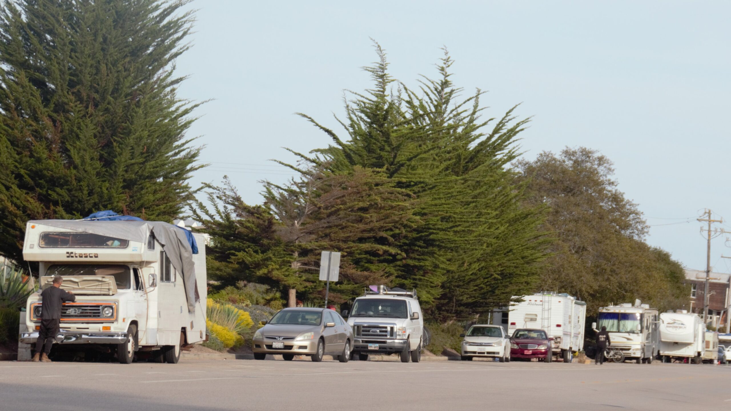 RVs and other vehicles line Delaware Avenue.