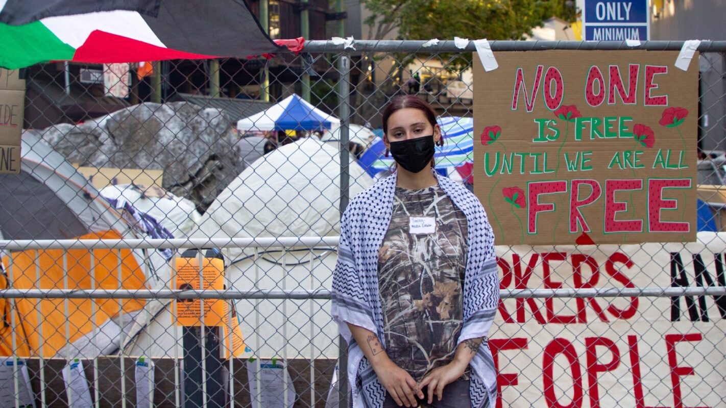 Sasha Gaza camp UCSC May 2024 Marcello Hutchinson-Trujillo 16 9 A photo of Sasha Stetler, media liason for UC Santa Cruz students that urged divestment from weapons manufacturers.