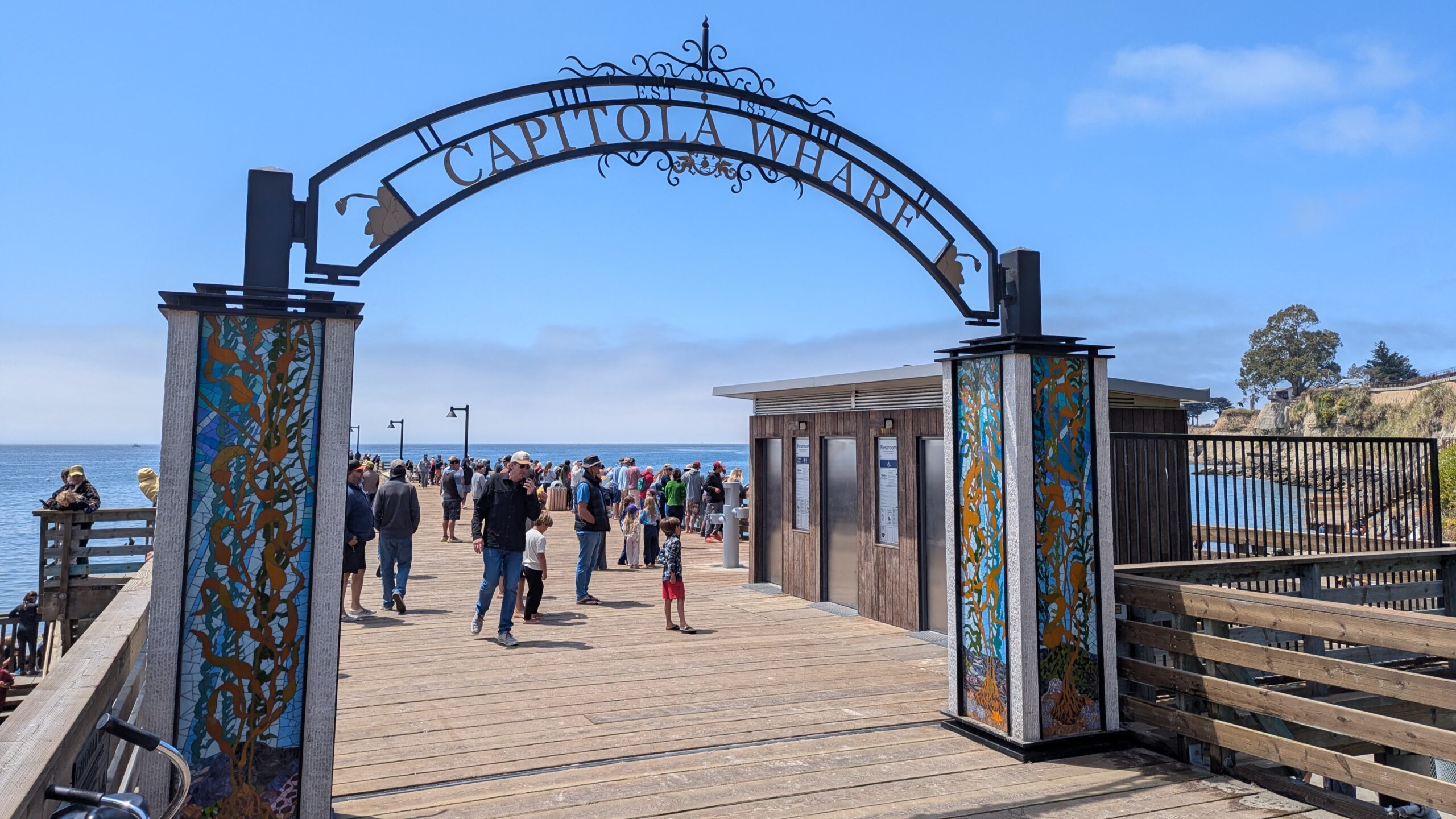 The entrance to the Capitola Wharf has an archway.