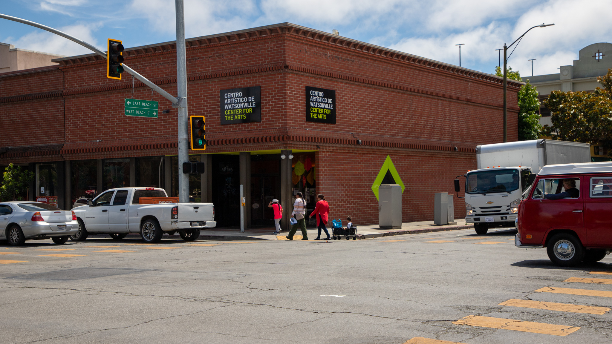 People cross at the intersection of East Beach Street and Main Street in Watsonville.
